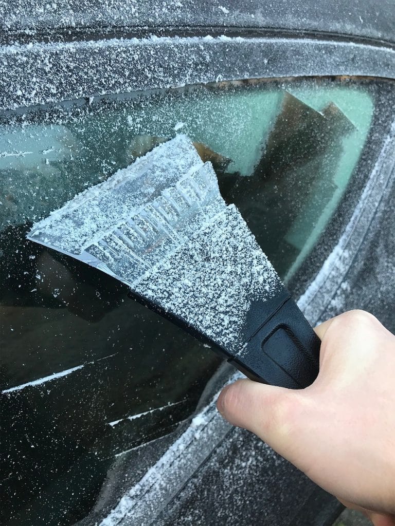 Scraping ice off a car window best way to prepare for cold weather